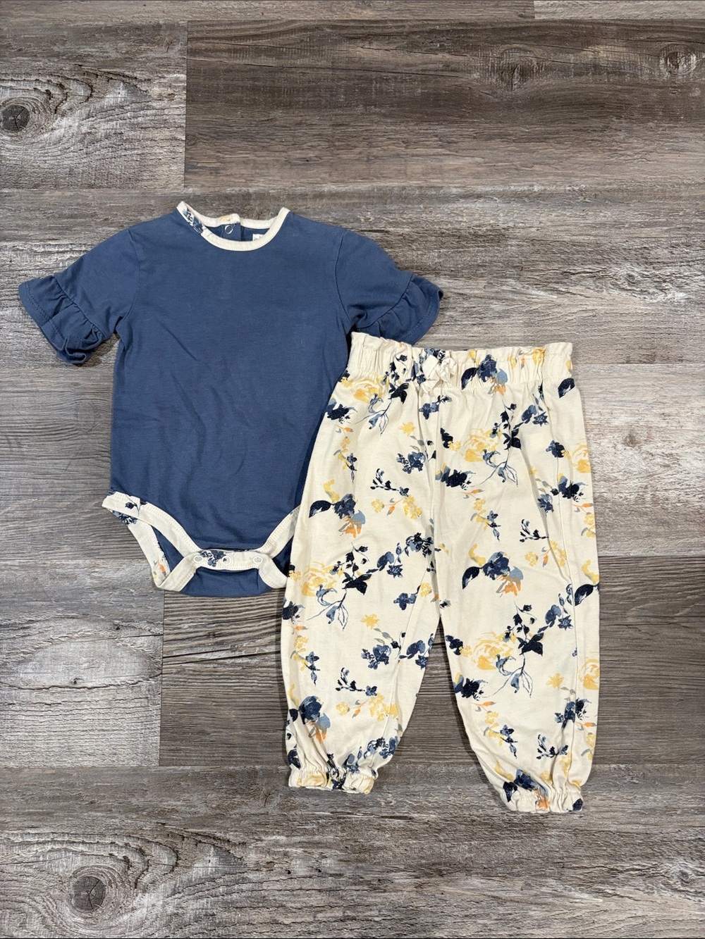Wonderly Navy Blue Bodysuit and Cream Floral Pants Matching Set